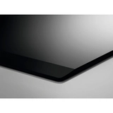 Электрическая варочная поверхность Electrolux EHF6547FXK - фото 5