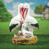 Садовая фигура "Семья аистов в гнезде" 