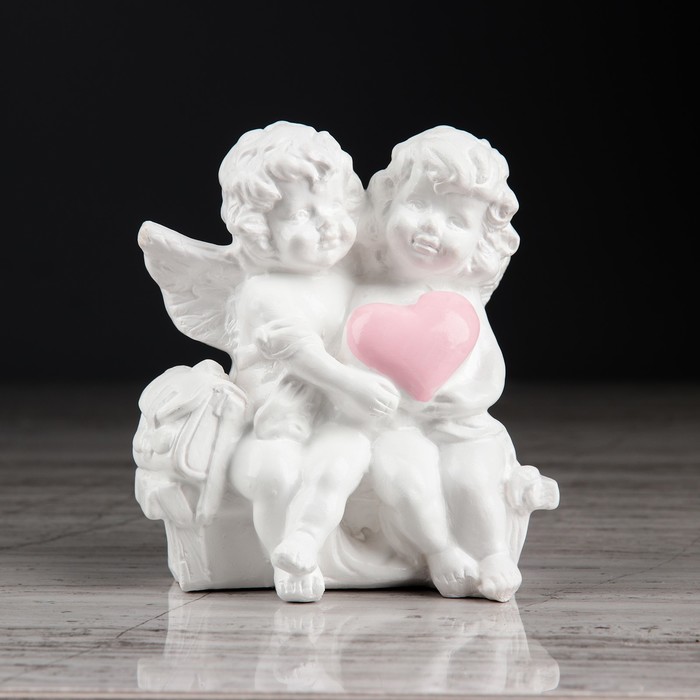 Статуэтка "Ангел на лавочке" с розовой отделкой 