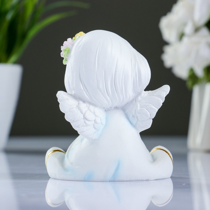 Фигура "Ангел с двумя цветочками в волосах" 7х8х9см 