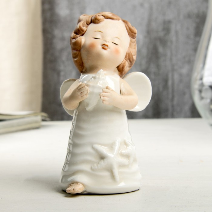 Сувенир керамика "Ангел-малыш в платье со звездами, с ракушкой в руке" 10,5х5,9х6,3 см 