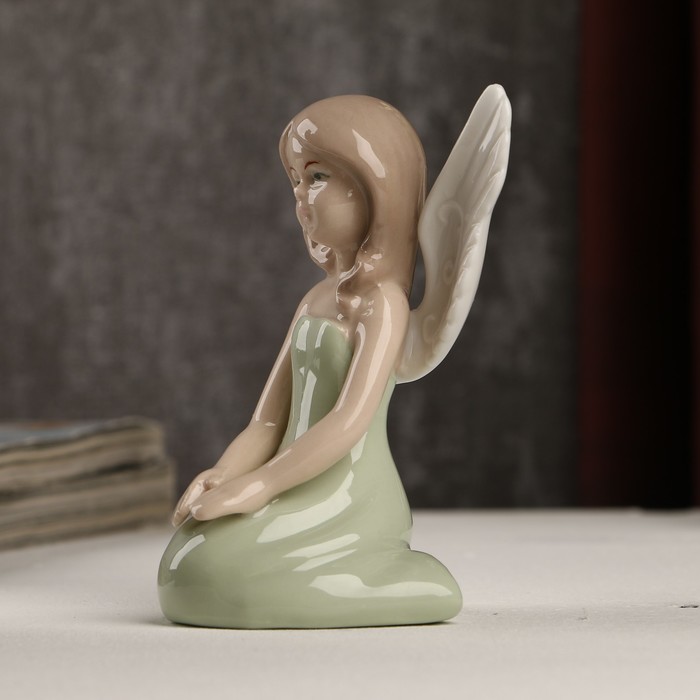 Сувенир керамика "Девушка-ангел с рисунком на крыльях в зелёном платье" 9,5х5х7 см 