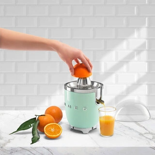 Соковыжималка для цитрусовых Smeg CJF01PGEU Зеленая