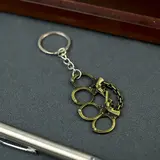 Брелок металл "Кастет" бронза 4х3х0,2 см  - фото 2