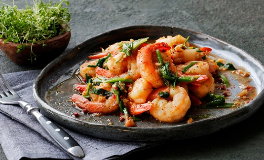 Креветки в темном соусе