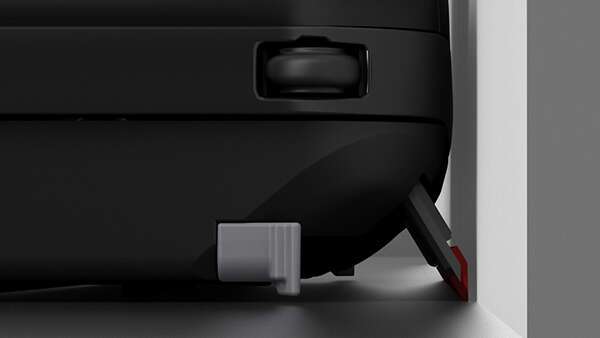 An image showing a POWERbot VR7000 device cleaning dust in hard-to-reach corners of a room, using its Auto Shutter function.