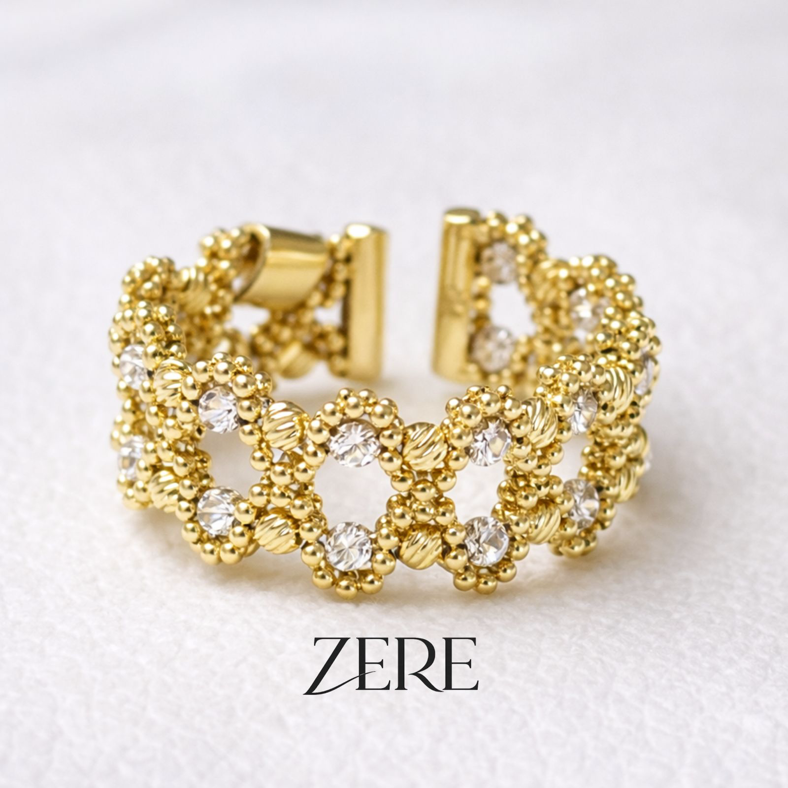 Кольцо Zere ажурное с фианитами 4.84гр купить,472000