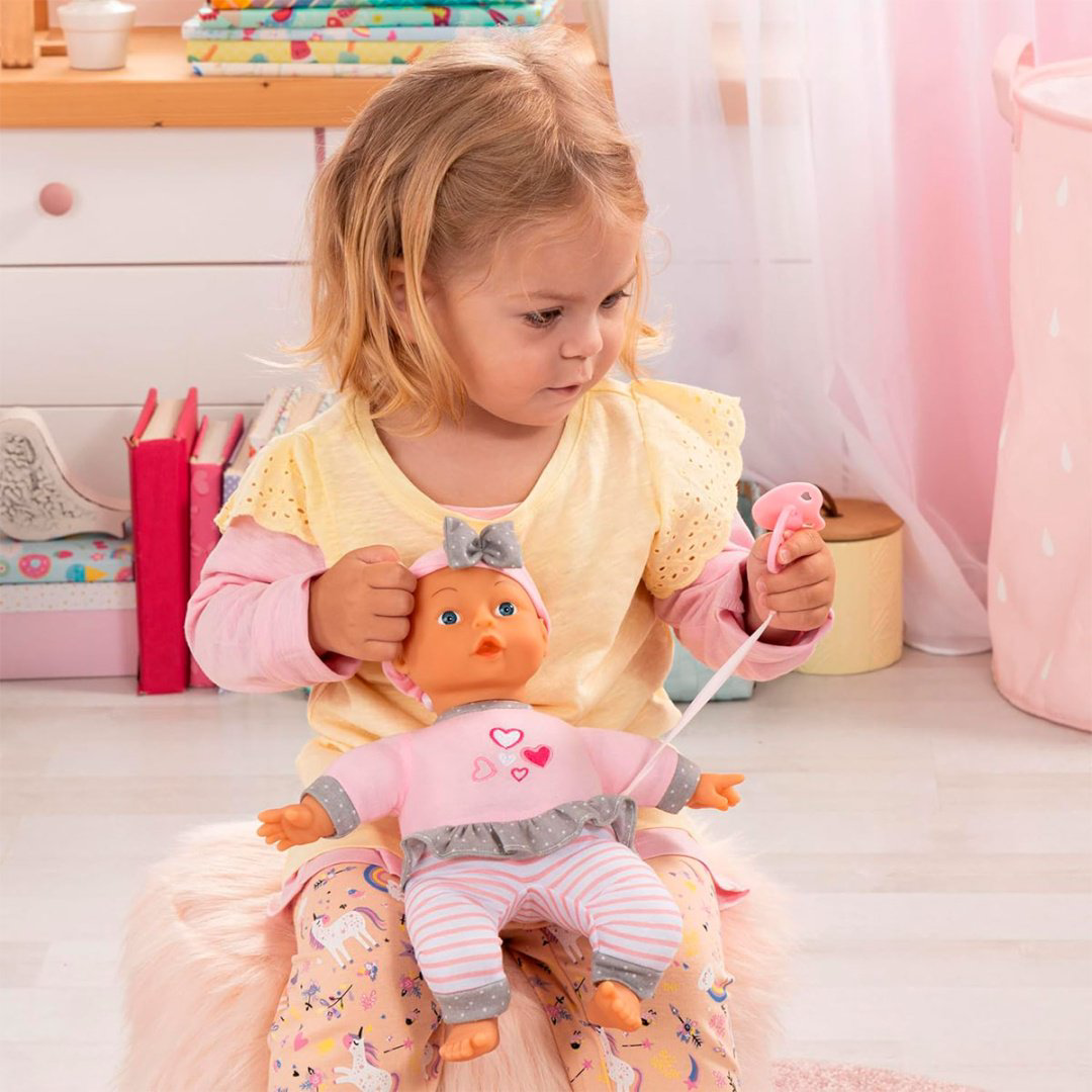 Пупс Bayer Dolls с мягким телом, в повязке с бантиком 30 см купить,NaN