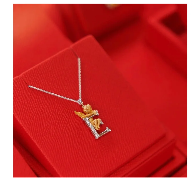 Колье Carrera y Carrera My Angel буква Е 0062.3 белое и желтое золото 6.33гр 35см  купить,NaN
