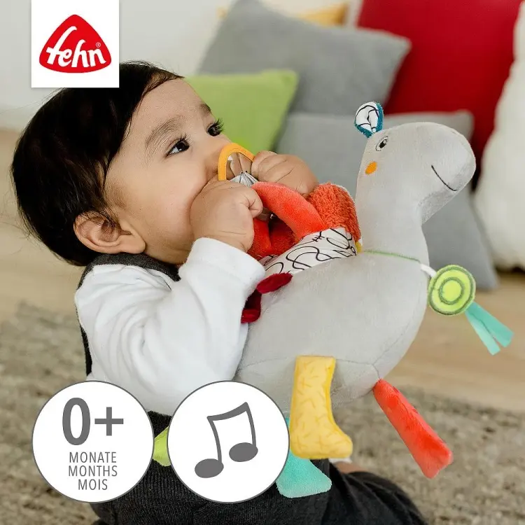Музыкальная игрушка Fehn Верблюжонок купить,NaN