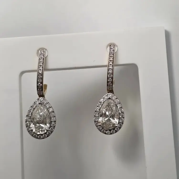Deimantas 122729787Золотой набор 585 с Lab бриллиантами (кольцо Груша 0.68Ct/ 0.45Ct VS1/F 16.5p, серьги Груша 1.03Ct VS2/F 0.44Ct VS1/F) вес 5.71 г золото, бриллиант выращенный купить,NaN