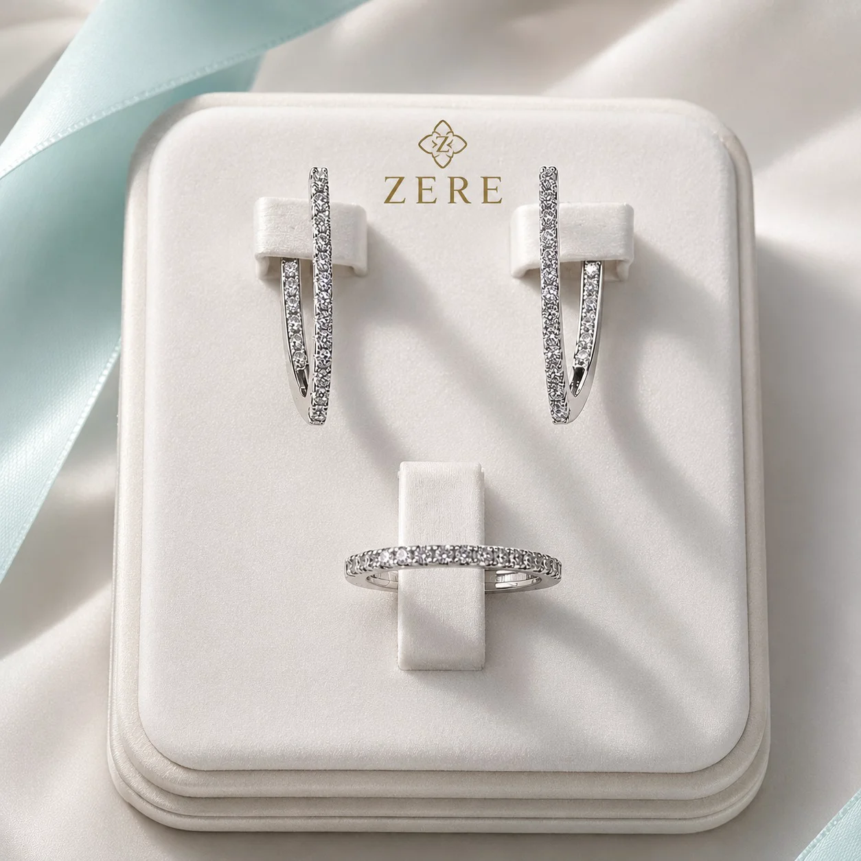 Комплект украшений Zere ZR070701 родированное серебро 10.2гр 18р купить,31750