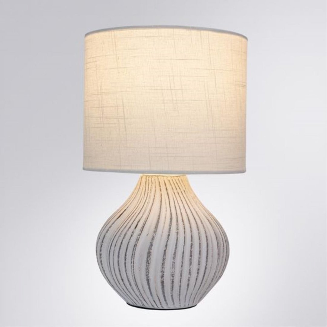 Настольная лампа Arte Lamp NUSAKAN NUSAKAN A5034LT-1WH Е14, 40 Вт, ткань, керамика купить,NaN
