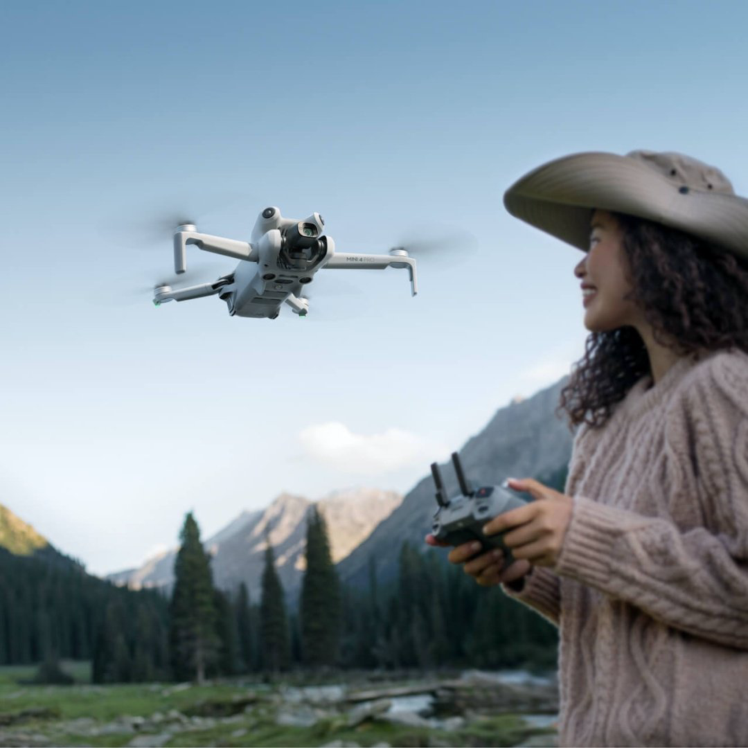 Дрон DJI Mini 4 Pro Fly More Combo (DJI RC 2) белый купить,NaN