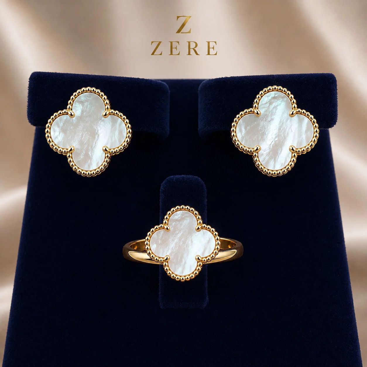 Комплект Zere серьги и кольца золото 585 7,47г 18,5р купить,629950