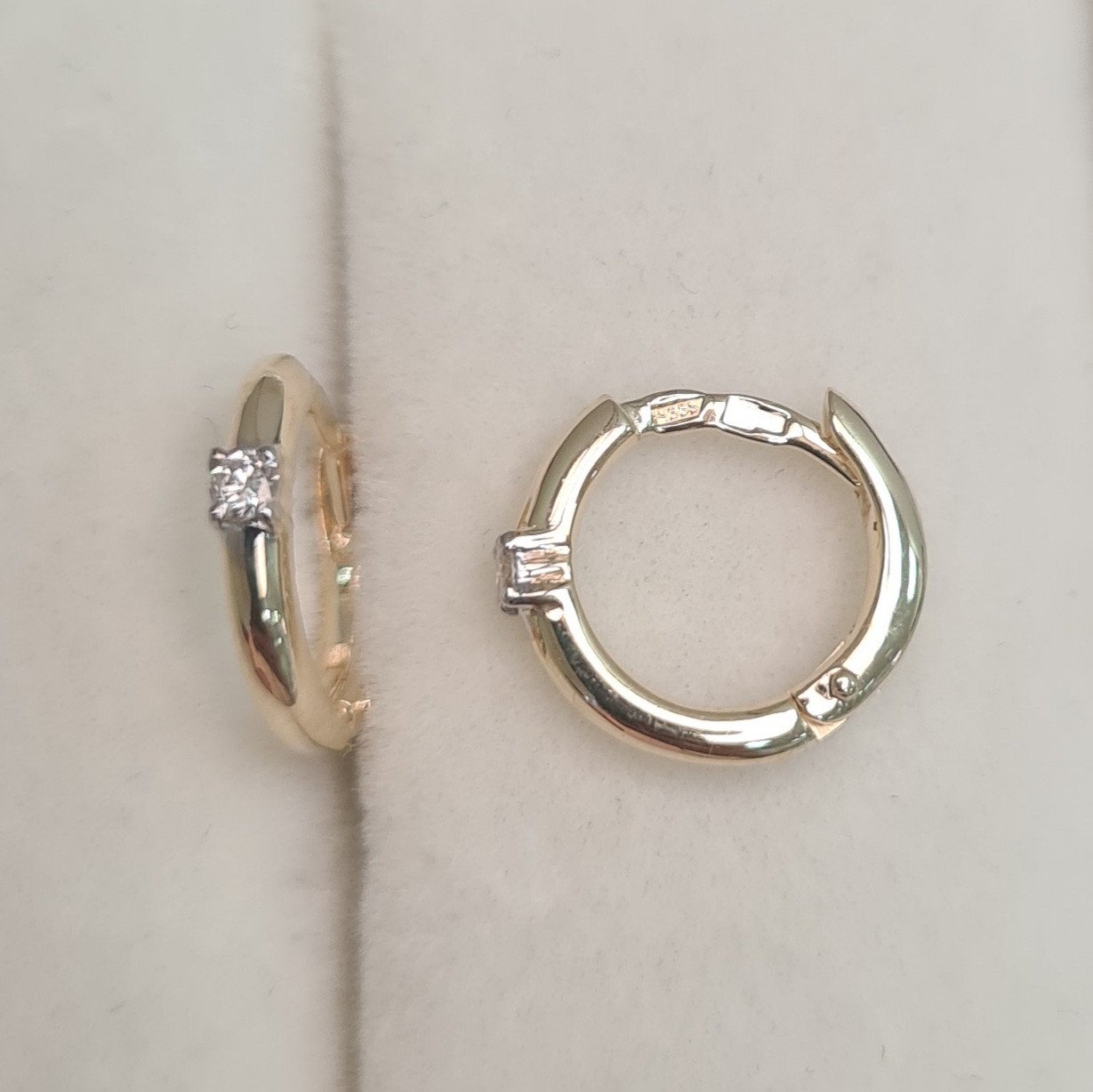 Серьги Deimantas 97349090 1,79гр 0,059ct. купить,NaN