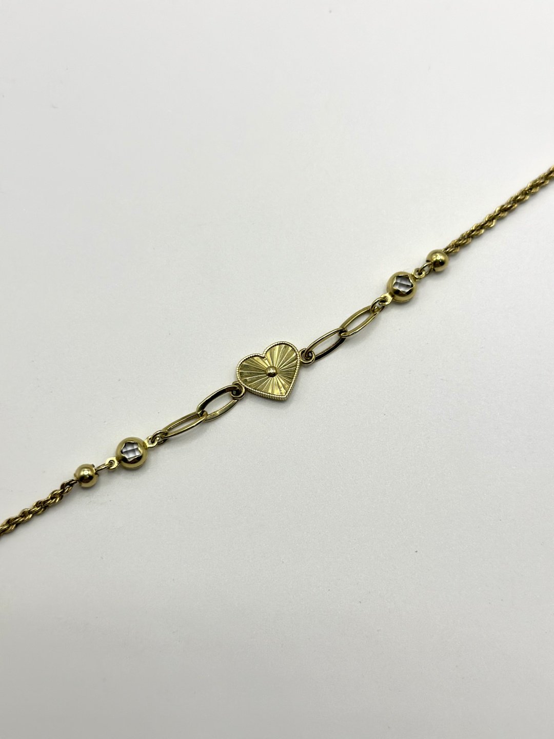 Браслет Zhanar Gold 3526363 длина 18.19 см, вес 4.48 г золото, плетение отсутствует купить,333200