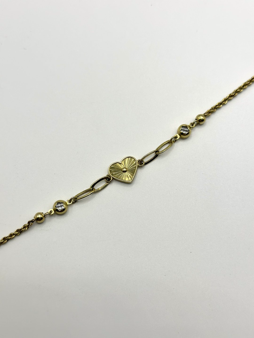 Браслет Zhanar Gold 3526363 длина 18.19 см, вес 4.48 г золото, плетение отсутствует купить,333200