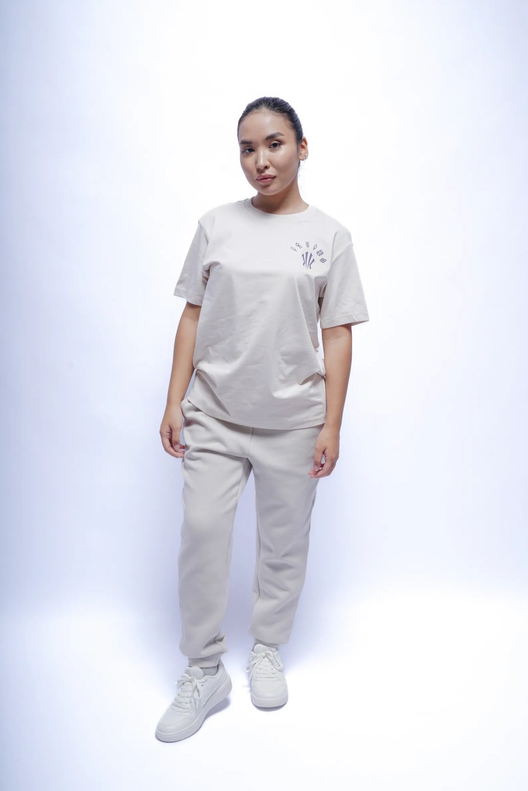 Спортивные брюки Anta 862537322N-3 бежевые XXL 52-54