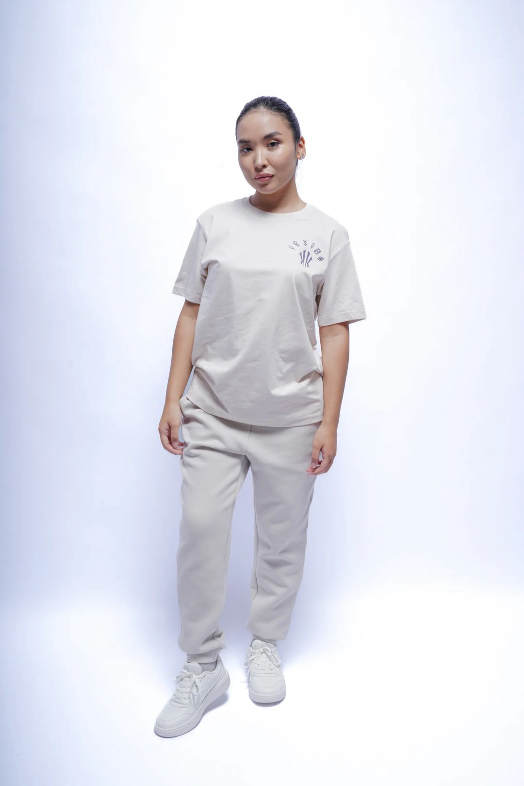 Спортивные брюки Anta 862537322N-3 бежевые XXL 52-54 купить,24490