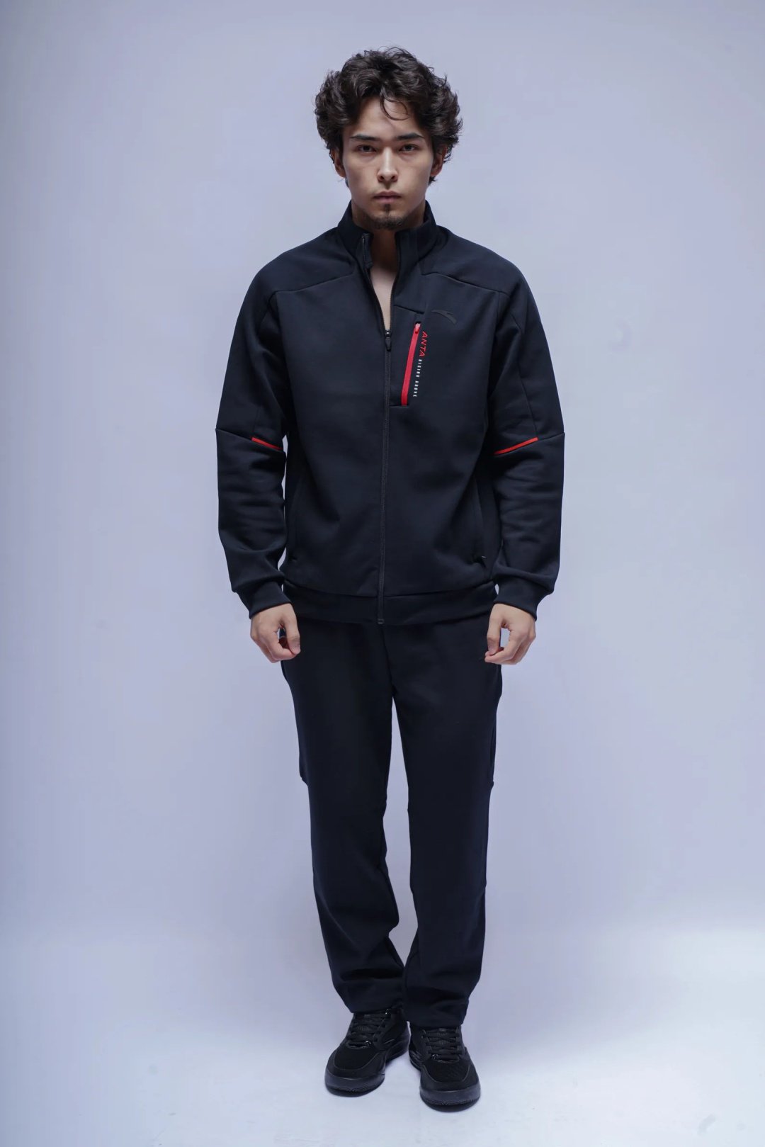 Спортивные брюки Anta 852547303N-1 черные L 50-52