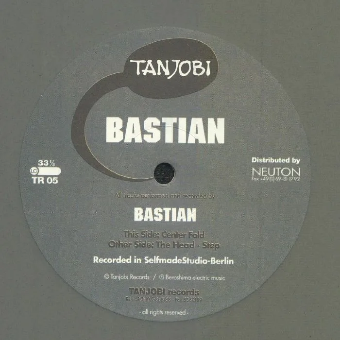 Front cover — BASTIAN — Centre Fold