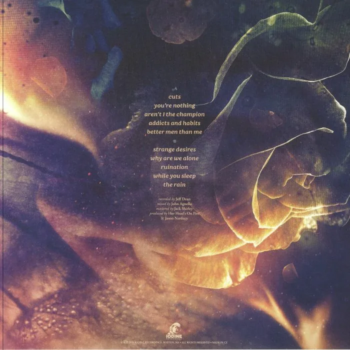 Back cover — HER HEAD'S ON FIRE — Strange Desires
