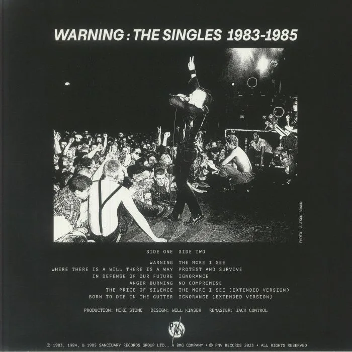 Back cover — DISCHARGE — Warning: The Singles 1983-1985