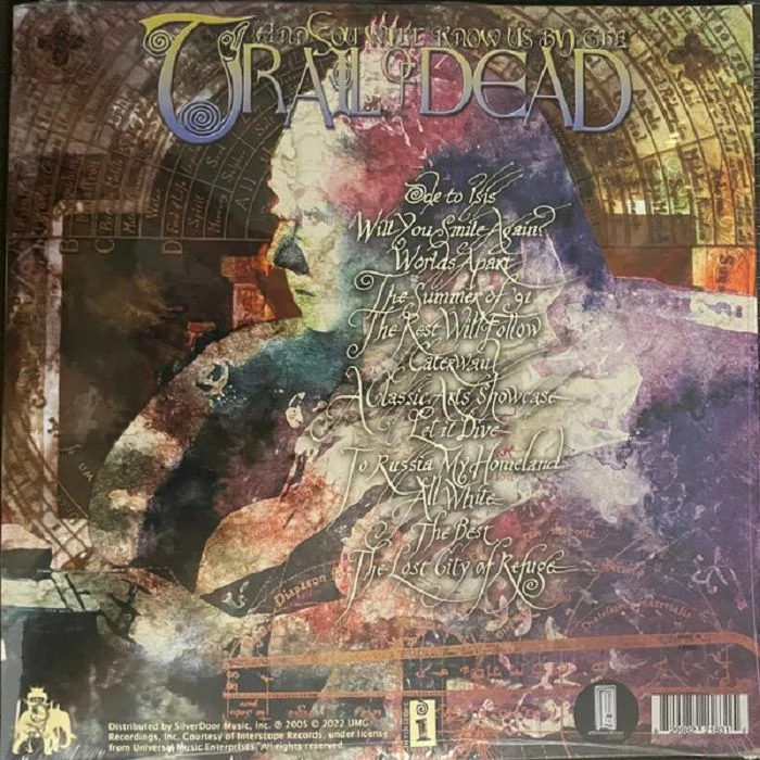 Обратная сторона обложки — AND YOU WILL KNOW US BY THE TRAIL OF DEAD — Worlds Apart (reissue)