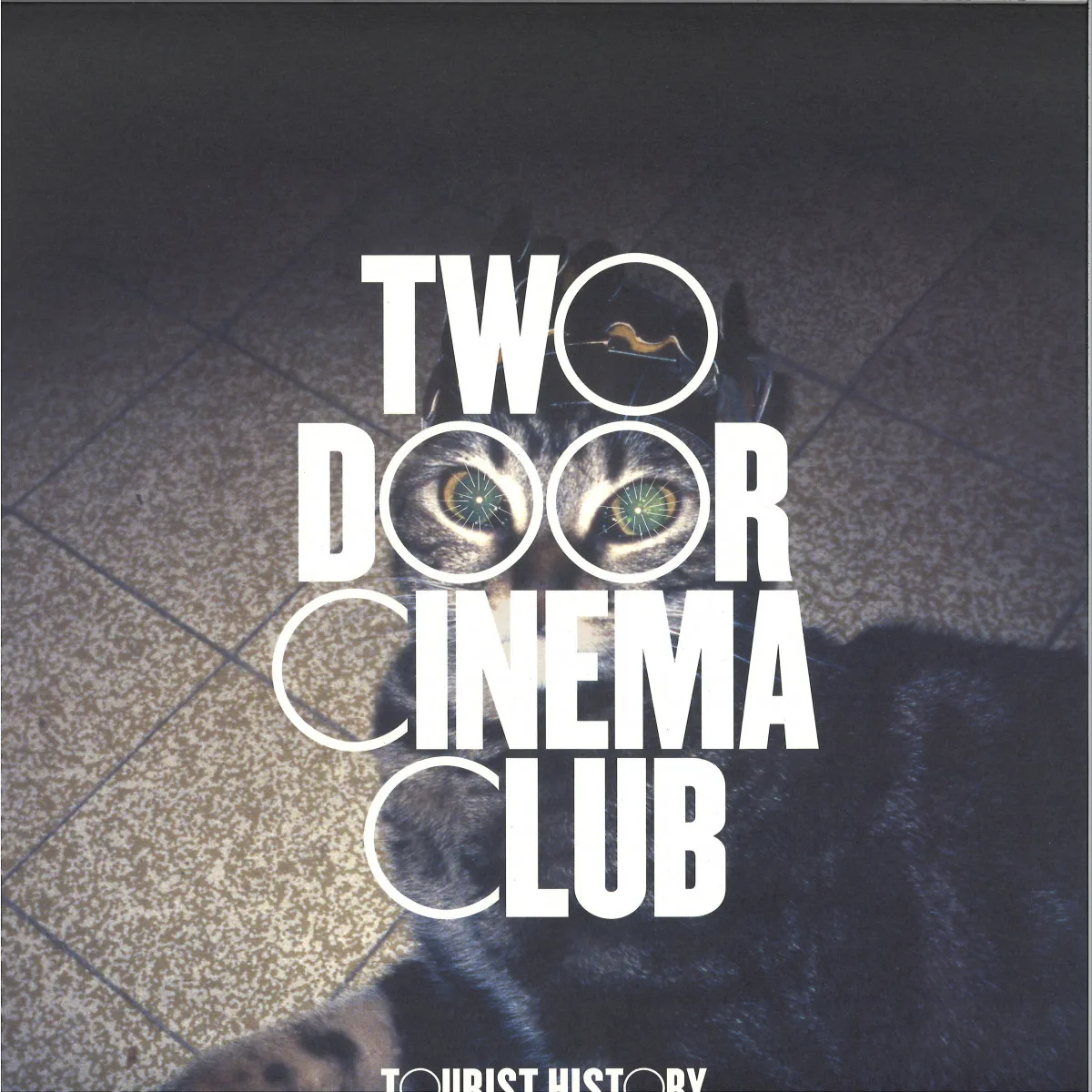 Лицевая сторона обложки — Two Door Cinema Club — Tourist History