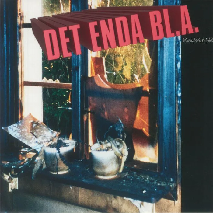 Front cover — DET ENDA BL A — Som Att Borja Ga Nedfor I En Stillastaende Rulltrappa