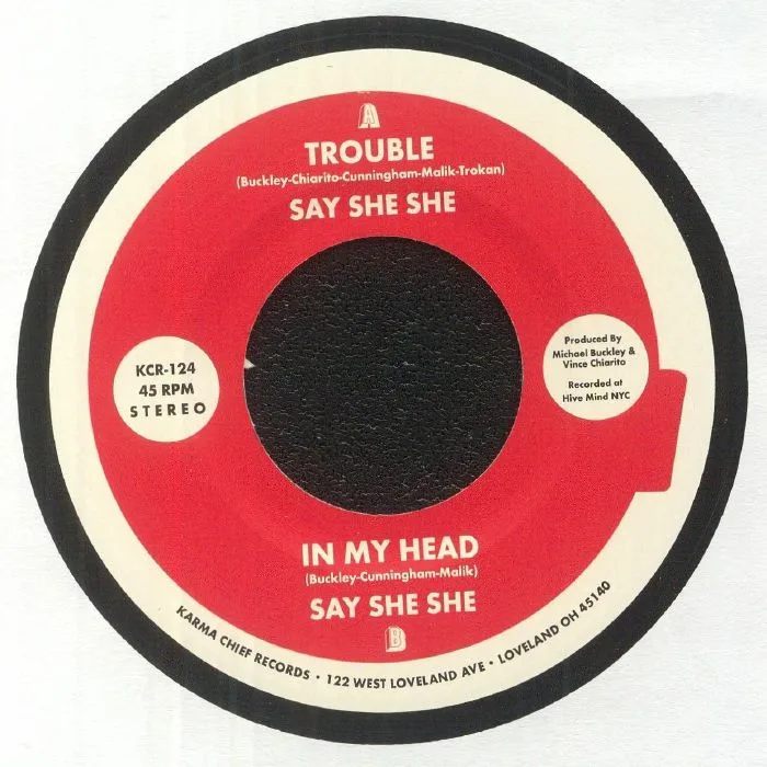 Back cover — SAY SHE SHE — Trouble