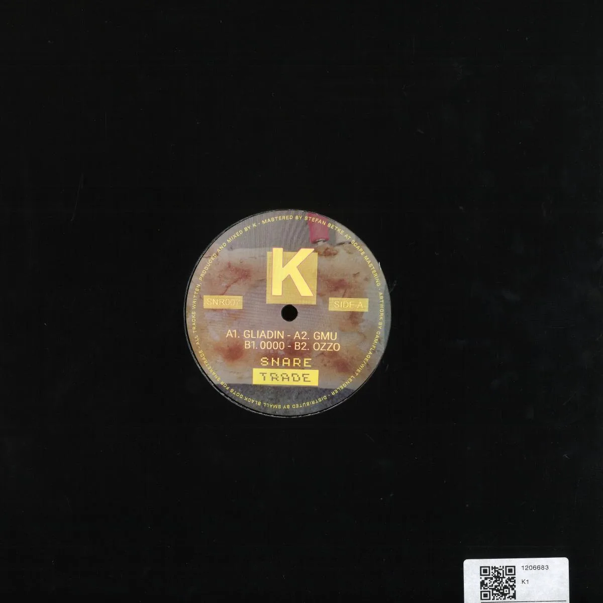 Back cover — K — Snaretrade007