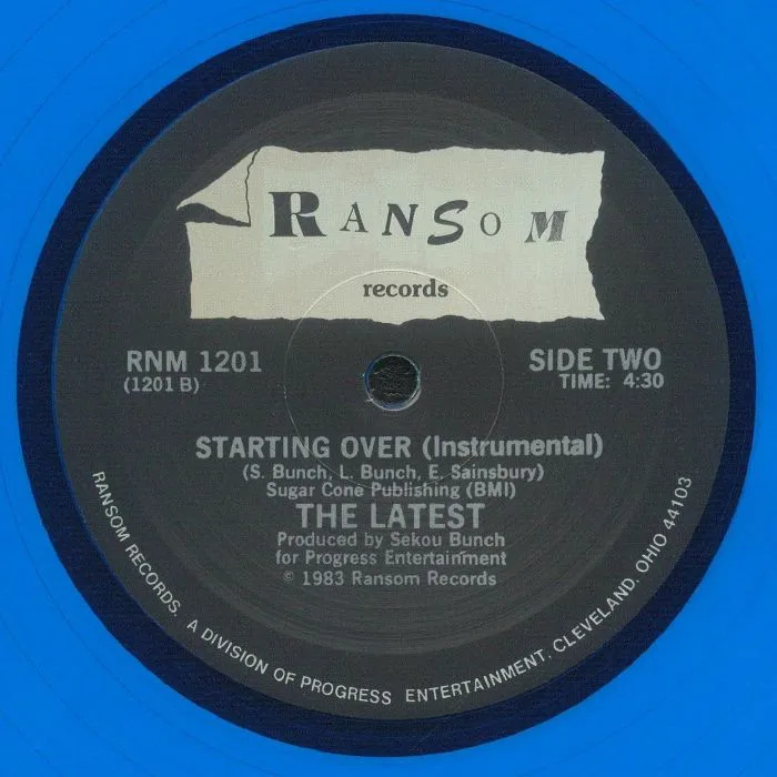 Back cover — The LATEST — Starting Over (reissue)