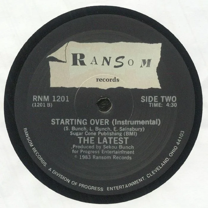 Back cover — The LATEST — Starting Over (reissue)