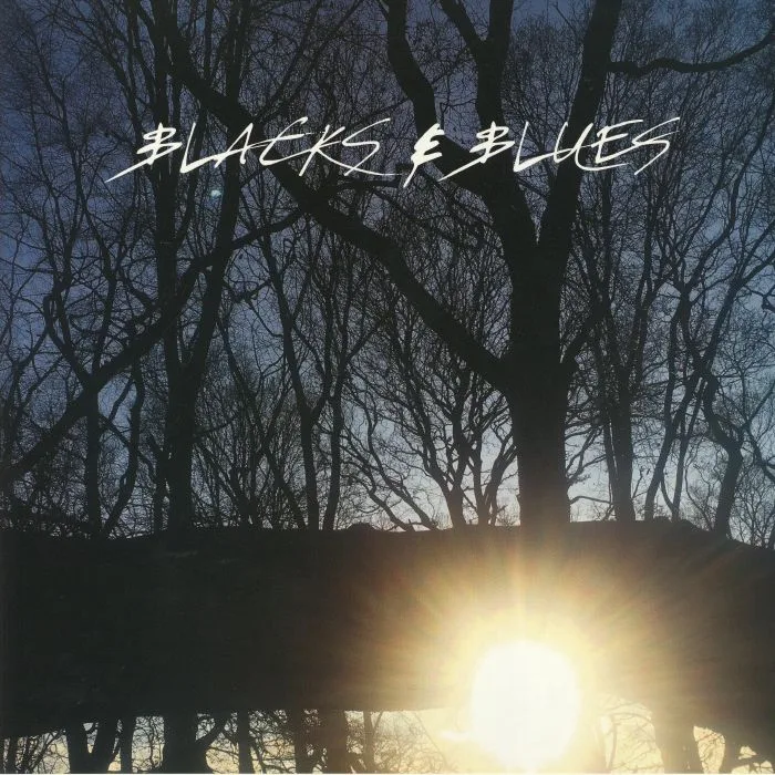 Лицевая сторона обложки — BLACKS & BLUES — Spin