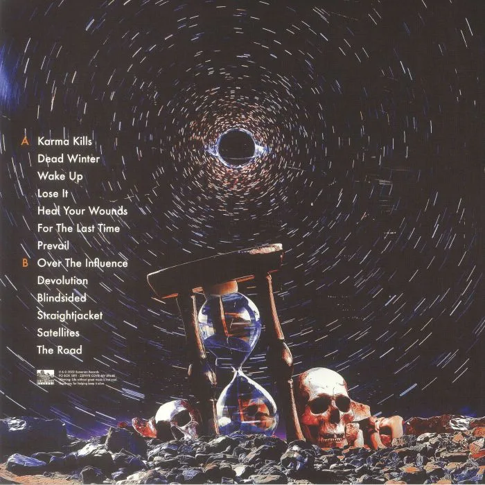 Back cover — THROUGH FIRE — Devil's Got You Dreamin